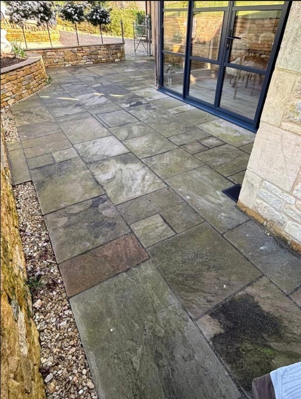 Patio pressure washing — before